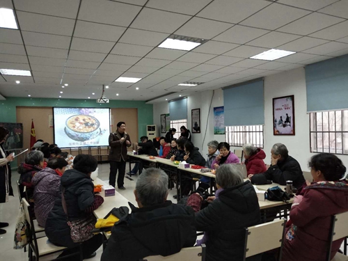 徐家棚街长轮社区开展腊八送粥暖心田活动