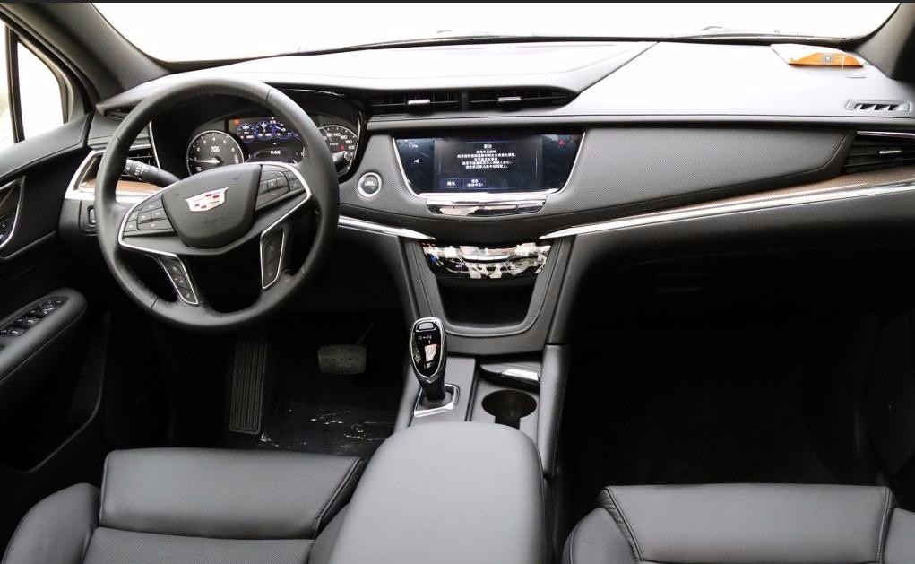 xt-5中控门锁电路图_电路图分享 凯迪拉克XT5在动力选择上使用了更适合中国市场的2.0T涡轮增压发动机。并且根据两驱和四驱车型的不同,发动机的调校功率也有所不同。两驱车型的最大功率为184kW,四驱车型的最大功率则达到了198kW,峰值扭矩均为400Nm。虽然,动力方面从上一代车型的3.0LV6发动机变成了2.0T涡轮增压,难免会让人质疑“小马拉大车”。但是在实际驾驶过程中,却感受到了凯迪拉克XT5的驾驶乐趣。 在模式的选择上,凯迪拉克XT5共有舒适模式、全轮驱动、运动模式和野外(土路)四种模式,其中除了舒适模