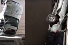 别笑女司机 男子错踩油门冲出高层停车场