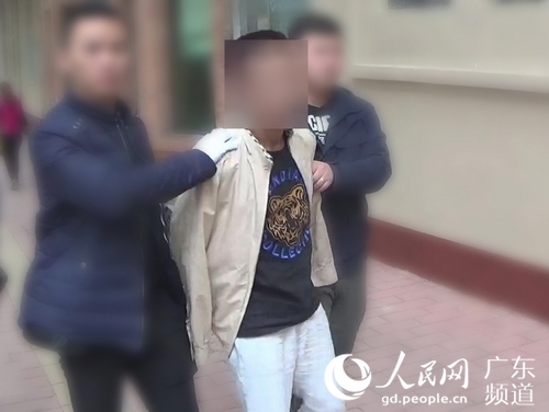 警方抓获犯罪嫌疑人王某。广州市公安局 供图