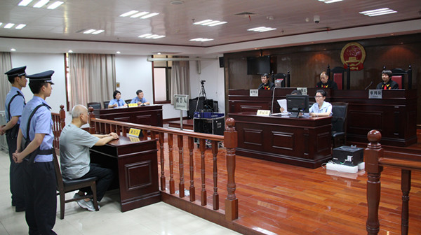 图为马勇受贿、滥用职权案一审宣判现场。郴州中院网站 图