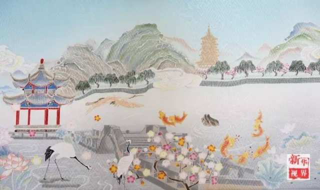 为迎接G20 杭州一家三口制丝绸画缋展现杭州景观(图)