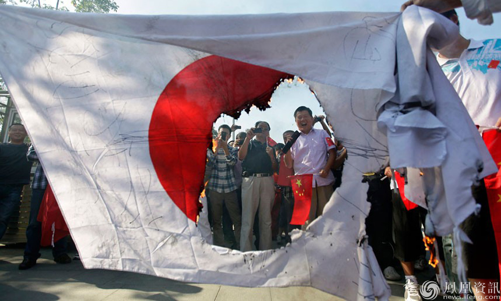日本国旗被烧图片图片