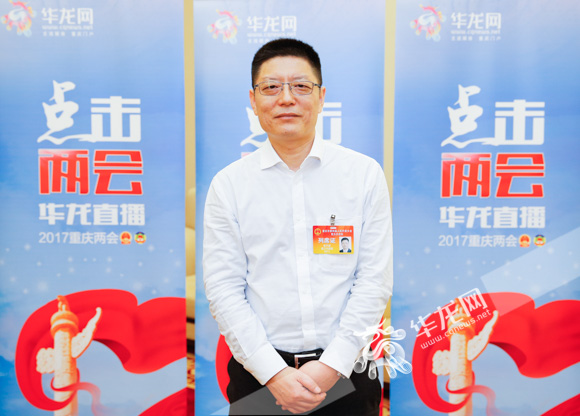 綦江区人民政府区长姜天波.记者 石涛 摄